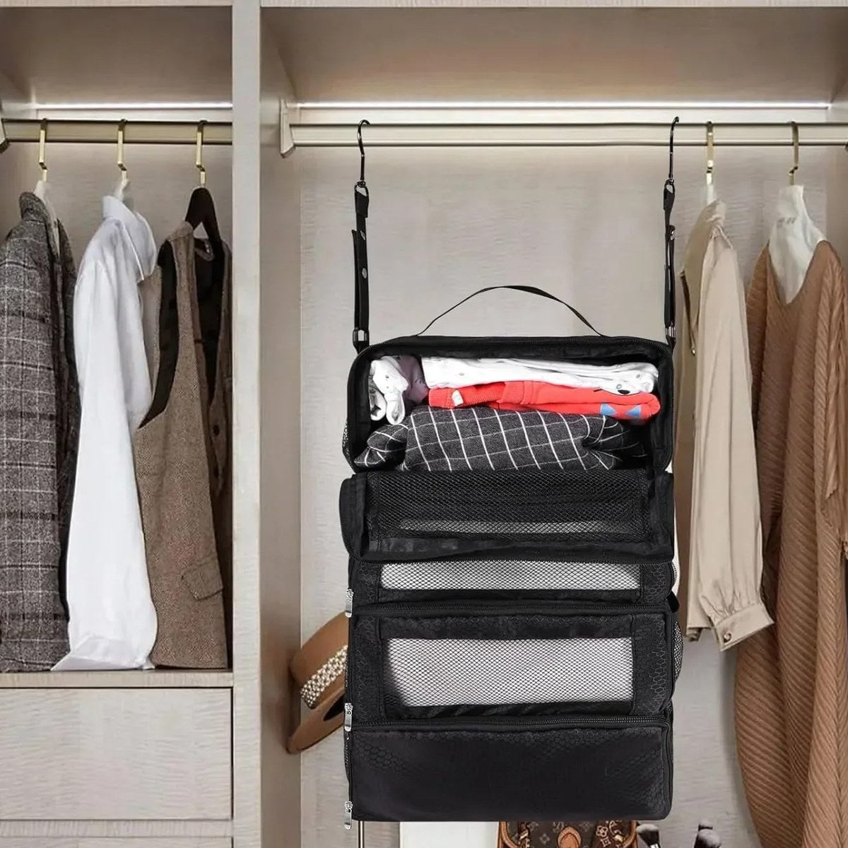 The shelves hanging from a closet rail between clothes