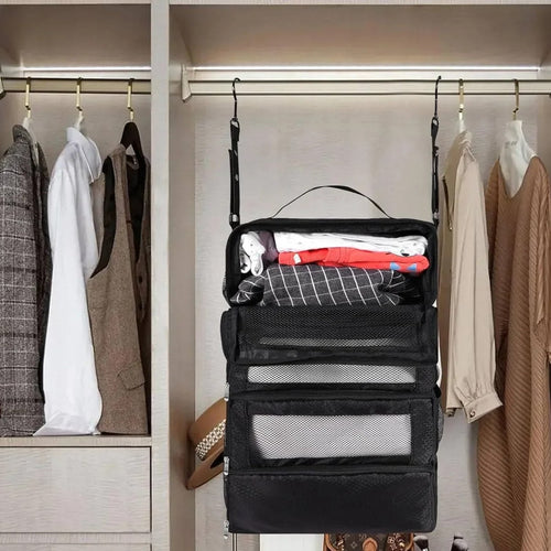 The shelves hanging from a closet rail between clothes